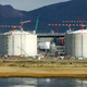 FILE PHOTO: FILE PHOTO: A general view shows the Sakhalin-2 project’s liquefaction gas plant in Prigorodnoye, about 70 km (44 miles) south of Yuzhno-Sakhalinsk, October 13, 2006. REUTERS/Sergei Karpukhin/File Photo/File Photo